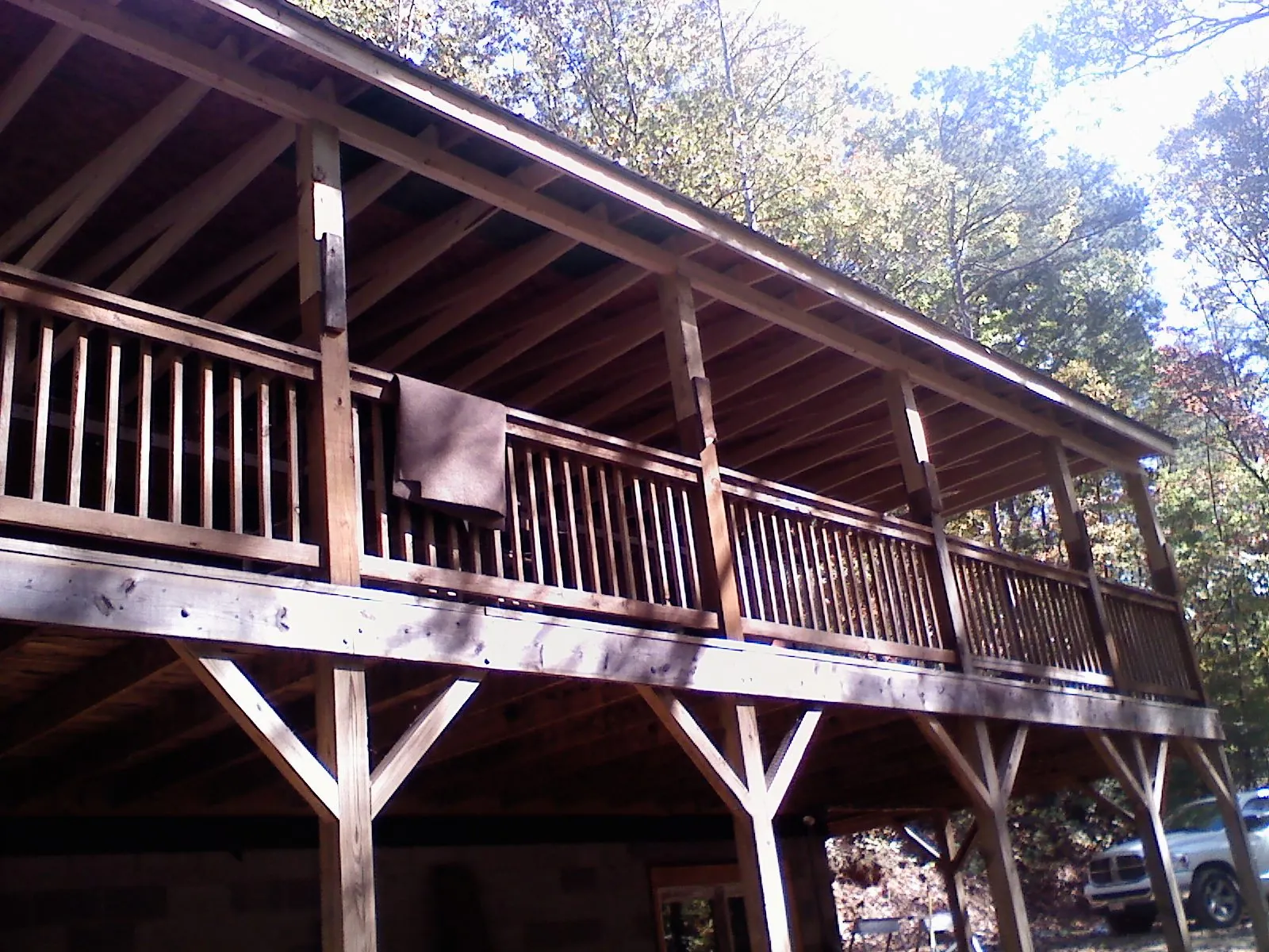 Timber framing under a new elevated porch and deck — Roof Leak Repair in La Honda by Roofing Brothers